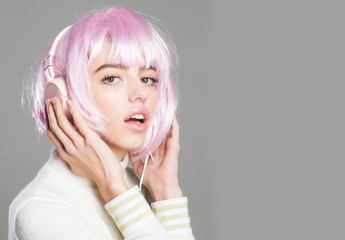 Wall Mural - girl in pink wig with headset