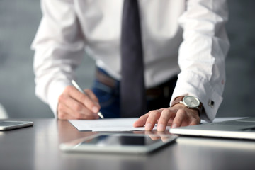 Wall Mural - Businessman signing documents