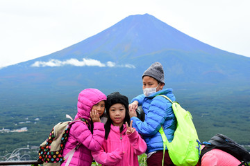 Happy Asian children at Kachi Kachi Ropeway with Fujisan backgro