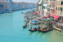 Aerial View Of The City And Traditional Gondolas On Grand Canal In Venice