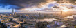 London, England - Panoramic skyline view of south London at sunset with famous skyscrapers and dark clouds over the city