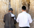 JERUSALEM, ISRAEL - MAY 26: Jews pray at the holy site. The Western Wall is the most sacred sites in Judaism, it attracts thousands of devotees every day, on May 26, 2013 in Jerusalem