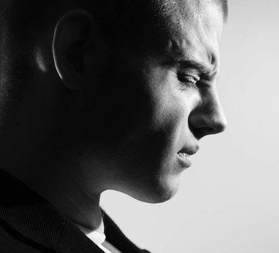 Fototapete - Man sad profile, black and white portrait