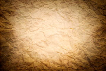 Old crumpled paper texture with vignette