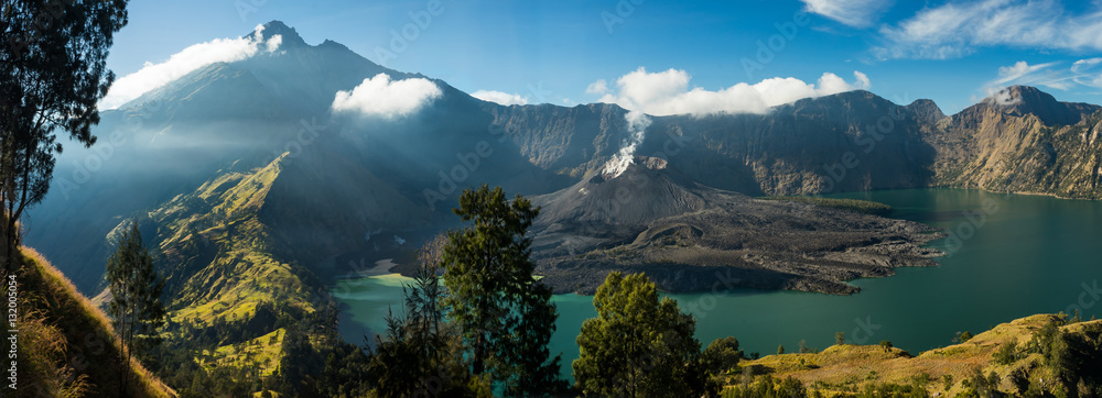 Mount Rinjani Crater Lake: View of crater lake and summit, volcano "Gunung Rinjani", Lombok, Indonesia. - obrazy, fototapety, plakaty 