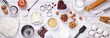 Baking tools and ingredients for cakes on white wooden background. Top view, flat lay.