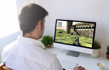 Wall Mural - man playing war videogame on computer