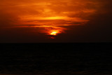 Fototapeta Morze - Magical very beautiful sunset in cloudy sky, sun ray in the sea of clouds