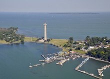 Aerial View Of Put In Bay's Marina And Perry's Victory & International Peace Memorial, Kelley's Island In The Far Background; Put-in-Bay, South Bass Island Ohio USA