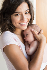 Wall Mural - woman with newborn baby
