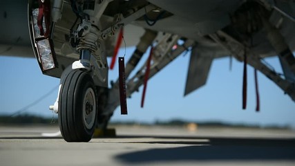 Wall Mural - Fighter aircraft detail with landing gear 