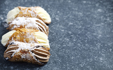 Wall Mural - Sicilian cannoli stuffed with ricotta cheese. Cannoli Siciliani