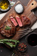 Grilled ribeye beef steak with red wine