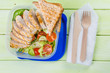 Lunch box with salad and chicken