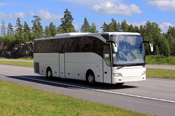 Wall Mural - white coach bus travel along freeway at summer