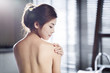 © Blue Jean Images - Back view beautiful young woman in a spa