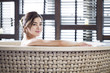 © Blue Jean Images - Beautiful young woman in bathtub