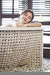 © Blue Jean Images - Beautiful young woman in bathtub