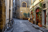 Fototapeta Uliczki - Narrow cozy street in Florence, Tuscany. Italy