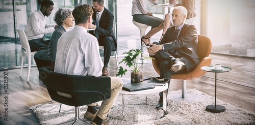 Fotomural Business executive interacting with each other