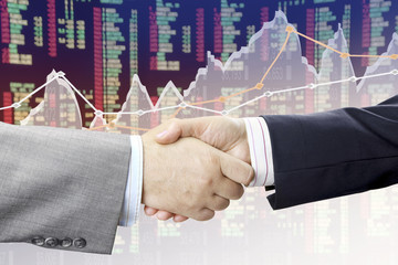 Aufkleber - Closeup of handshake on financial chart background 