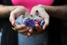 Woman's Hands Holding Crystals