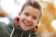 © Africa Studio - Portrait of cheerful teenager outdoors on blurred background, closeup