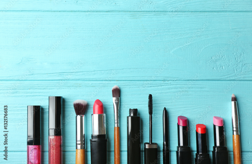 Set of decorative cosmetics on wooden table