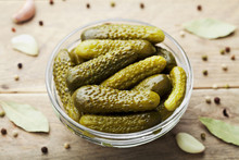 Pickled Gherkins Or Cucumbers In Bowl On Wooden Vintage Table.