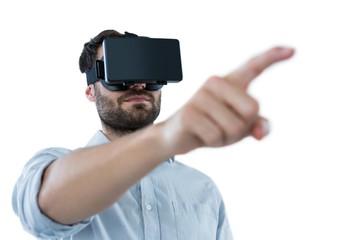 Wall Mural - Man using virtual reality headset