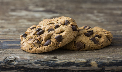 Pair of Chocolate Chip Cookies on Rustic Wooden Background