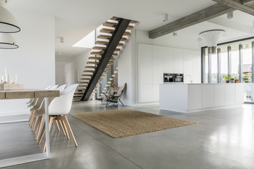 Open floor apartment with staircase