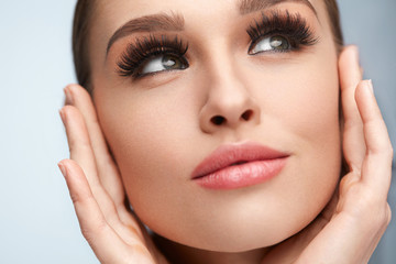 Wall Mural - perfect face makeup. woman with soft skin, long black eyelashes