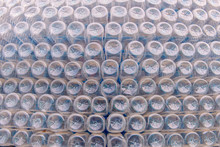 Stack Of Bottom Plastic Bottles Texture For Background