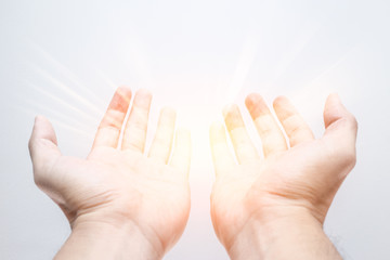 ask god bring a new think in your hand . offer posture open palm two hand with light bright