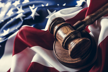 Wooden gavel and USA flag