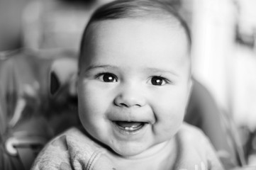 Baby boy at home. close up portrait .black and white