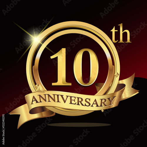 Fotografie, Obraz 10 years golden anniversary logo celebration with ring and ribbon