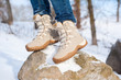 © Анна Ковальчук - Close-up of hiking boots in the snow