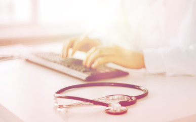 Wall Mural - male doctor typing on the keyboard