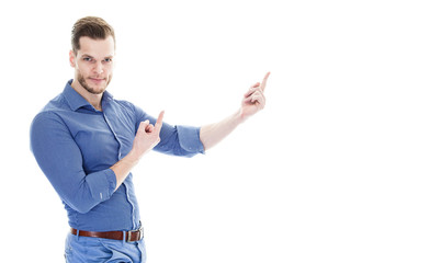 young casual man presenting something with both hands and a smil