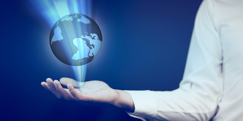 Wall Mural - Businessman holding global network