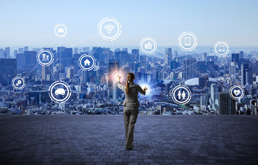 Aufkleber - modern cityscape and business person, IoT(Internet of Things), ICT(Information Communication Technology), abstract image visual