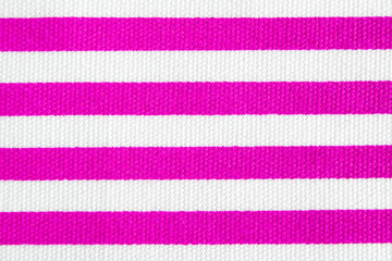 Wall Mural - Textile background with pink and white stripes. Fabric texture