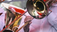 Close-up Of Man Playing On Trombone