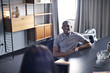 © Andy Paul - Black businessman in an office meeting