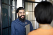 © Andy Paul - Asian businessman talking to an office colleague