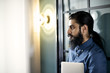 © Andy Paul - Asian businessman standing in an office doorway