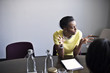 © Andy Paul - Businesswoman in an office meeting