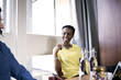© Andy Paul - Businesswoman discussing with colleague in meeting room
